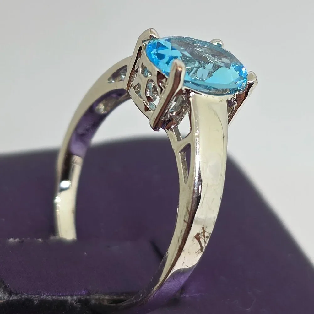 Beautiful Silver Oval Faceted Light Blue Rhodium Plated Solitaire Ring Sz 6.75